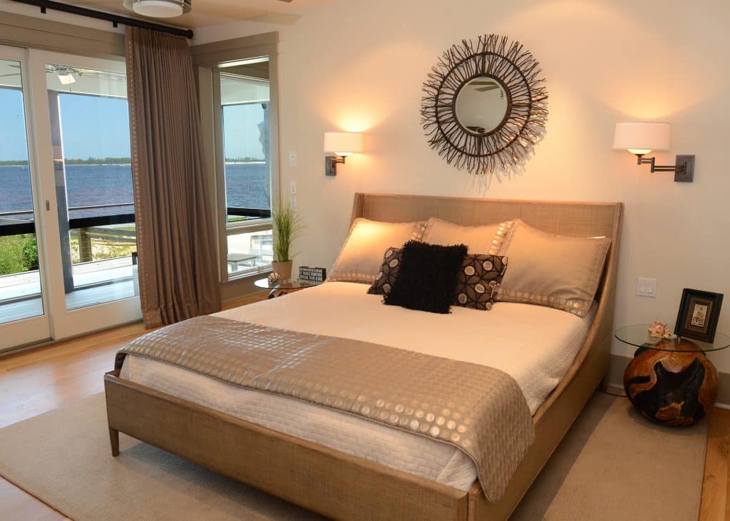 Adams master bedroom with view of the water designed and constructed by Rita Jones Construction in Northwest Florida