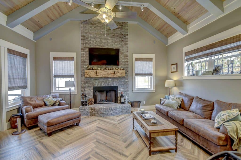 Dupont Seabreeze Forest Lane grand living room with fireplace designed and constructed by Rita Jones Construction in Northwest Florida
