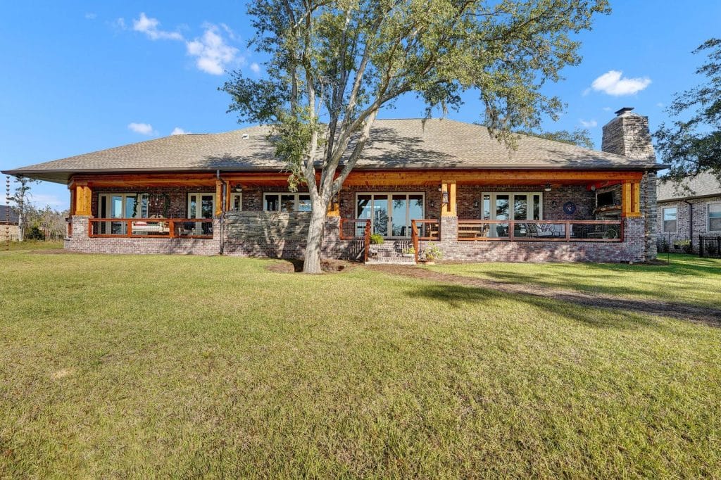 Barros home view of the large back porch designed and constructed by Rita Jones Construction in Panama City Florida